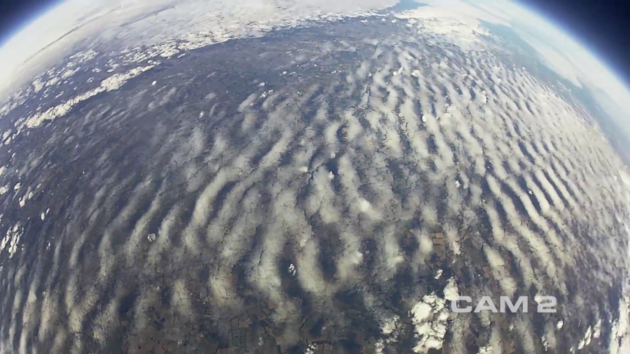 Earth and cloud cover filmed from above during the LEGO Ezra in Space mission